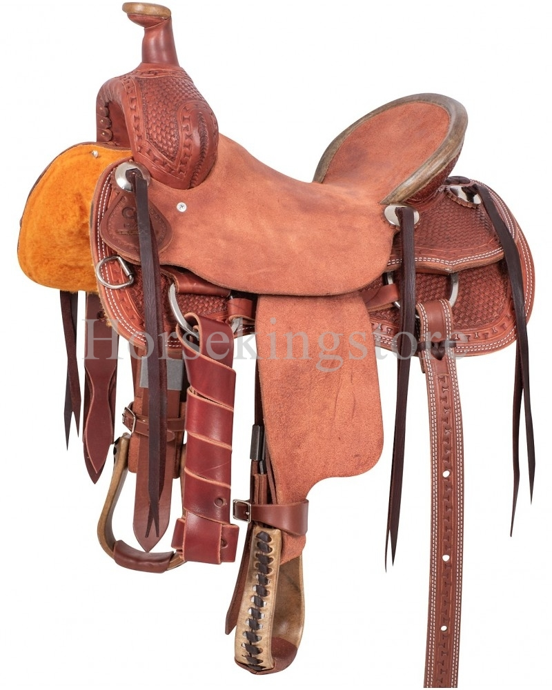 Selle western en cuir Roping Cashel brun clair avec tapis orange, étriers et sanglons, cuir tressé et fente de sangle en détail.